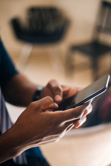 Person holding their phone